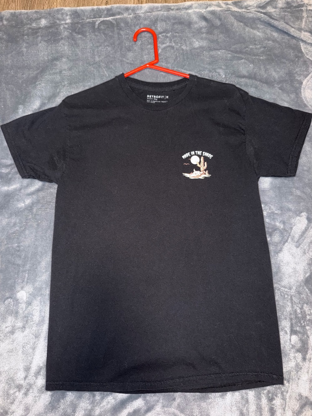 Retrofit Black Short-Sleeve Tee with Small Surf Graphic
Double Sided
No flaws -